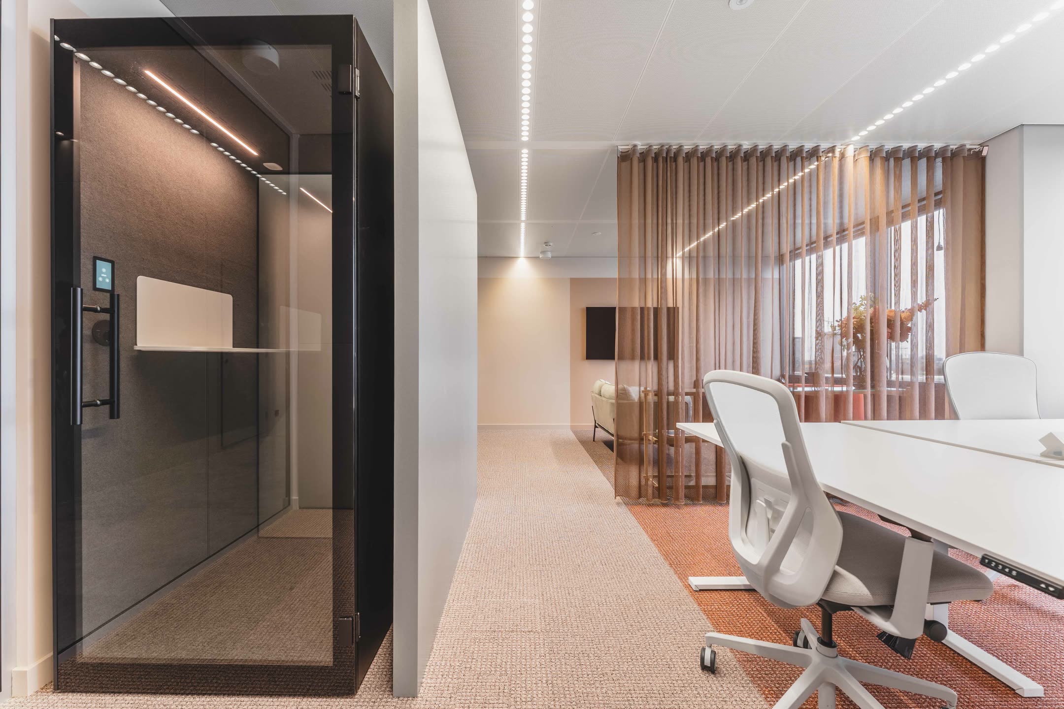 Private office with phone booth and lounge area