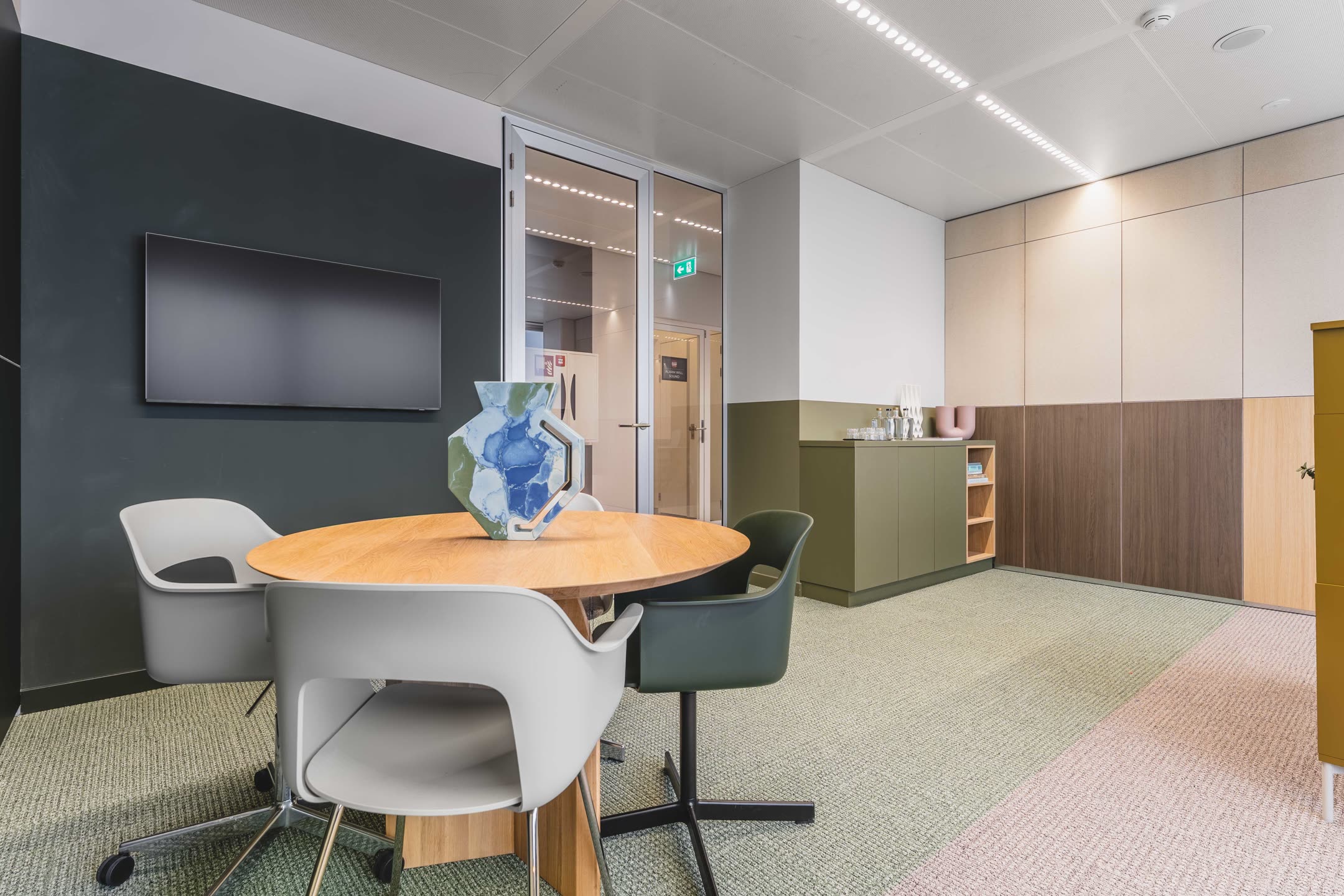 Meeting area with custom furniture and hospitality details
